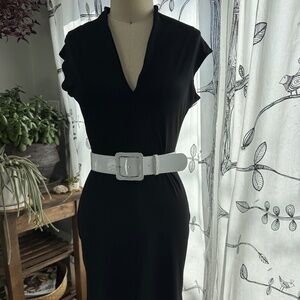 Knee length black dress with white belt